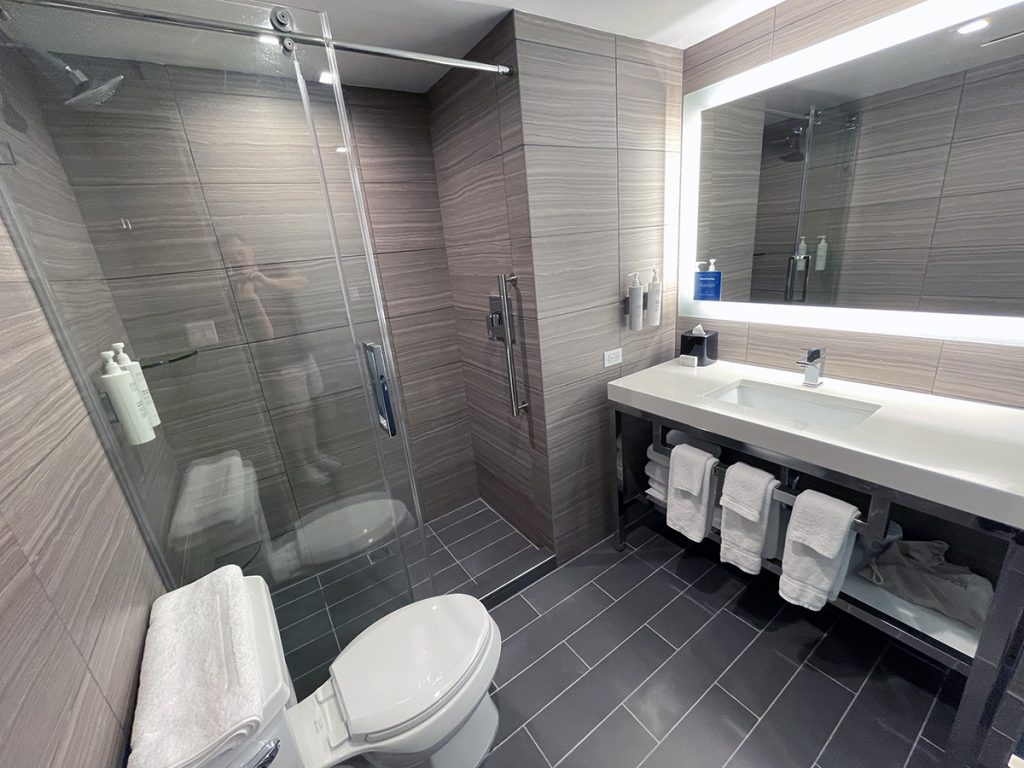 Spacious and well-lit bathroom at Hilton Garden Inn Times Square North
