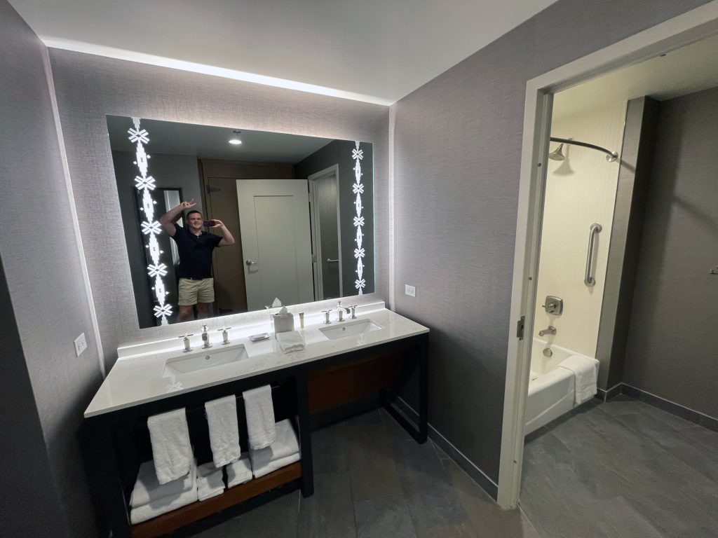 First section of bathroom with his and her sinks