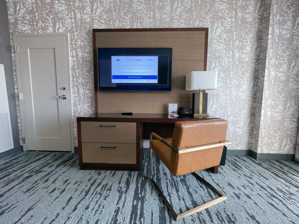 Work area and TV in a room at Gaylord Rockies