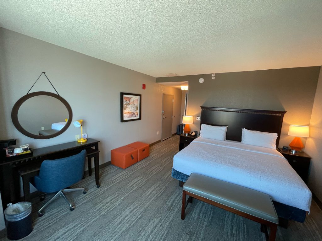 Desk and king bed at Hampton Inn National Harbor