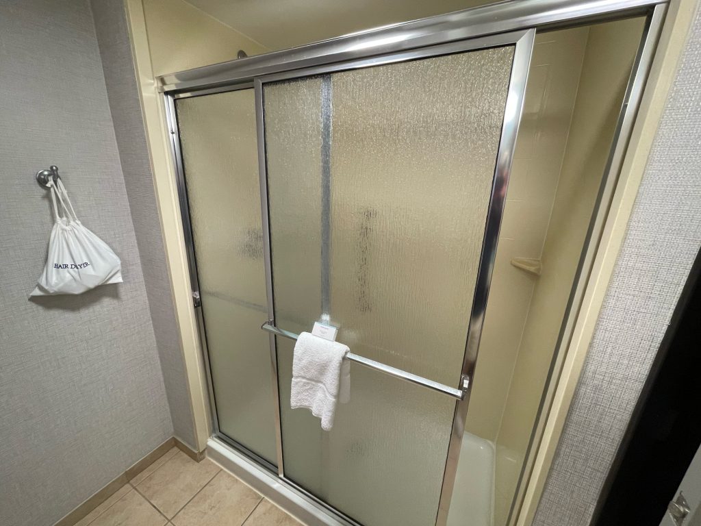 Walk in shower in guest room at Hampton Inn National Harbor