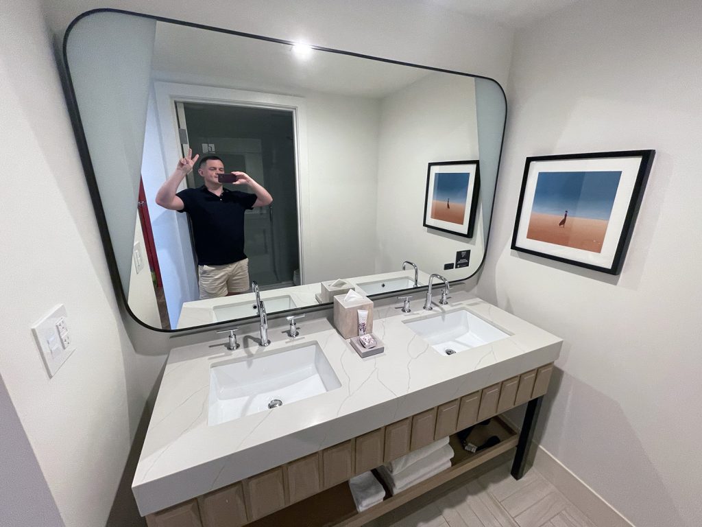 Bathroom with two sinks in guestroom at Virgin Hotels Las Vegas
