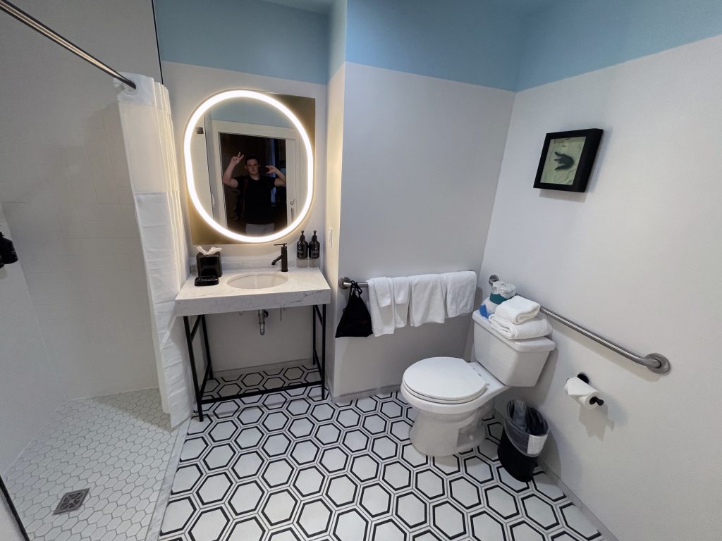 Bathroom and shower in room at Hotel Indigo New Orleans