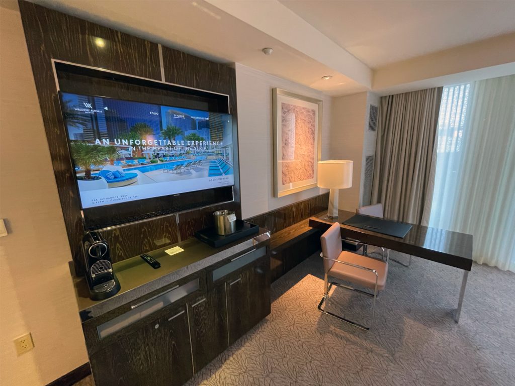 Desk and entertainment center at Waldorf Astoria Las Vegas